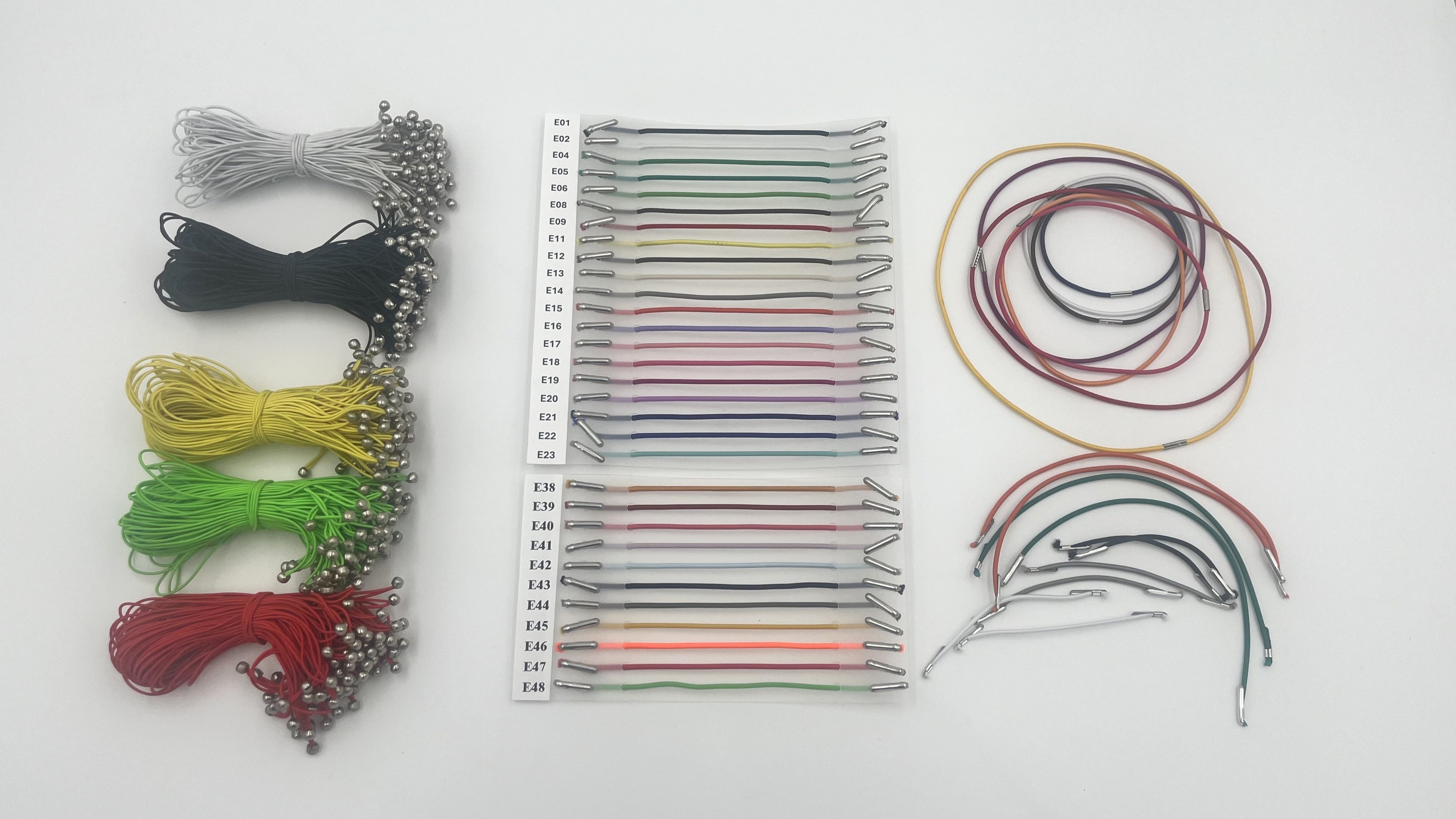 Elastik med metalsplitter eller i ring - laves på bestilling. Levering 1-2 dage.