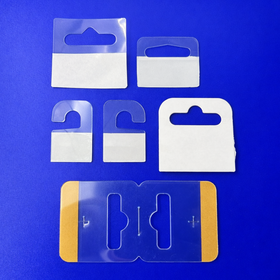 Selvklæbende hangtab i pap og plast